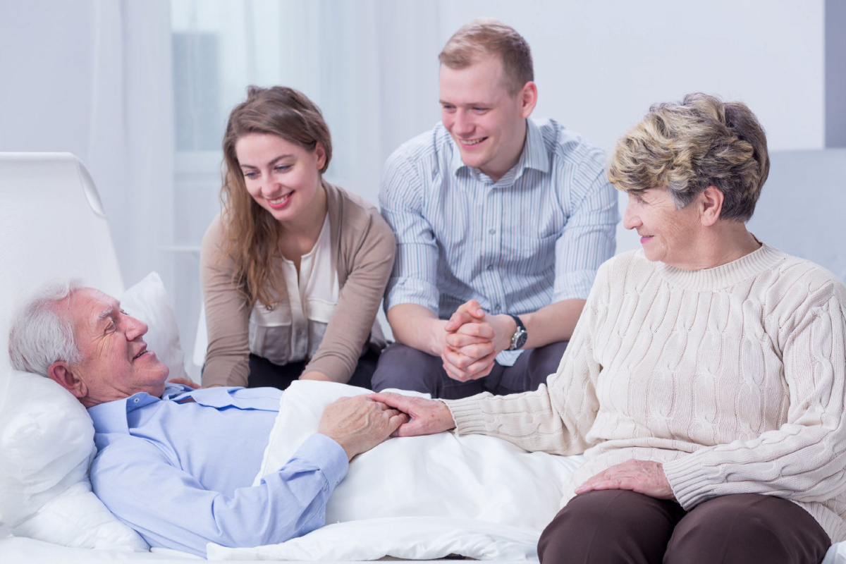 Elderly man receiving palliative care at home